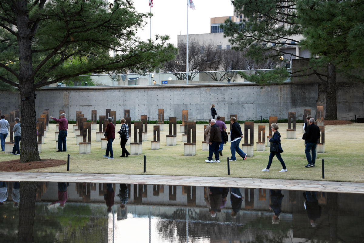 014 Fun Club travelers explore the Field of Empty Chairs at the Memorial.JPG